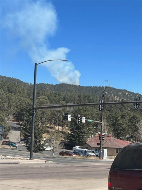 Fire burning along Rampart Range Road near El Paso, Teller counties